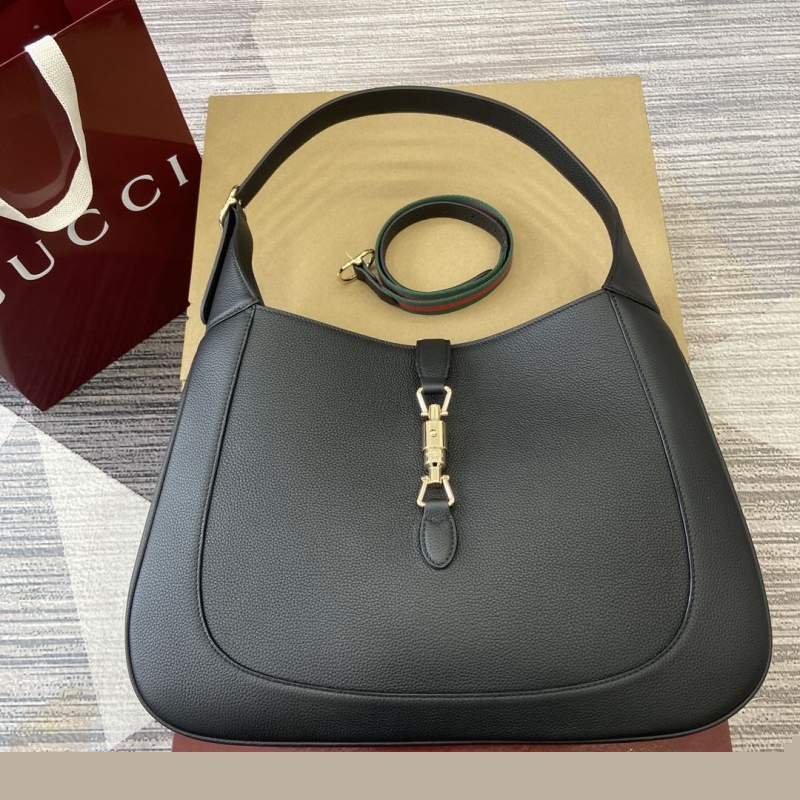 G*u*i top handle bags